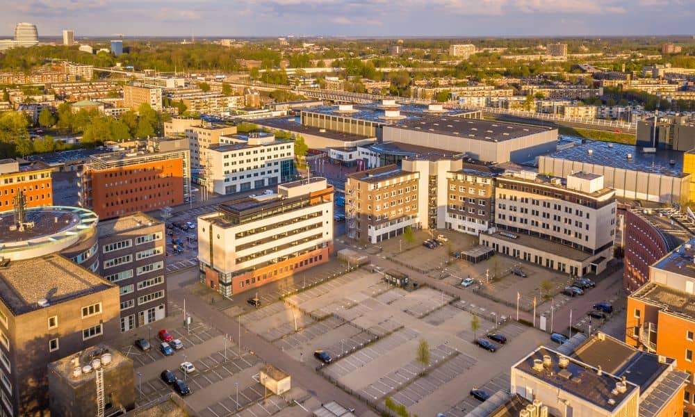Aerial view of a commercial property and parking area for an ALTA title survey